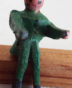 Tiny c1930s Wooden Erzgebirge Sitting Male Figure In Green Clothes & Brown Hat @ £8.95