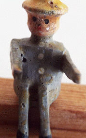 Tiny c1930s Wooden Erzgebirge Sitting Male Figure In Grey Clothes & Yellow Hat @ £8.95